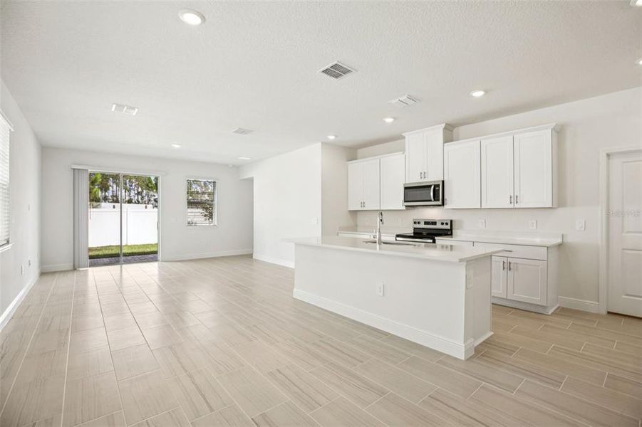 Furnished interior view inside a new home in Cyrene at Minneola - Villas, Minneola (Image 5).