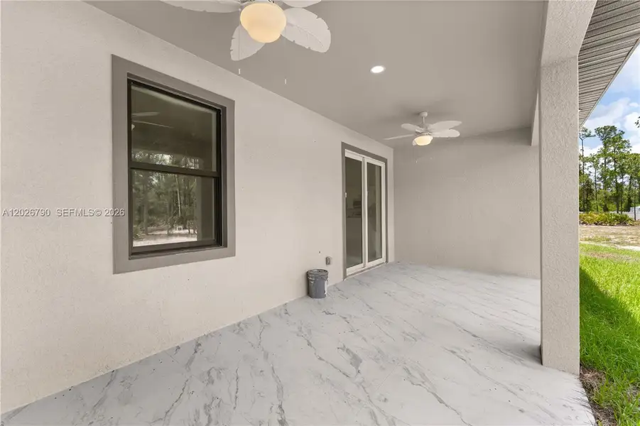 Exterior details and patio area of a home in , Lehigh Acres (Image 17).
