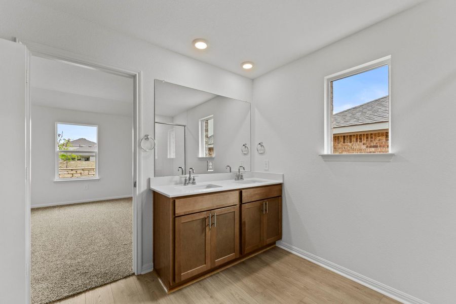 Furnished interior view inside a new home in Bar W Ranch, Leander (Image 7).