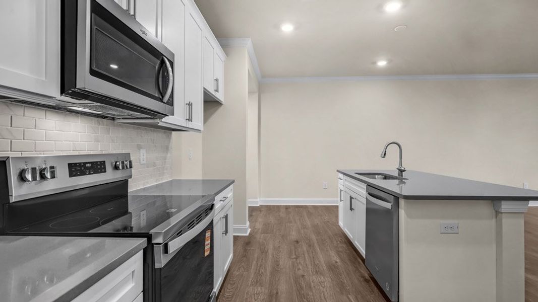 Representative furnished interior of a home built from the Linville by D.R. Horton in The Meadows at Kinsley, Jamestown (Image 7).