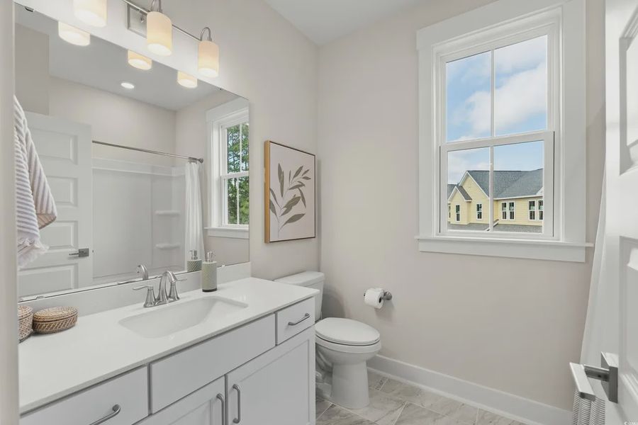 Furnished interior view inside a new home in Long Bay Golf Club, Longs (Image 21).