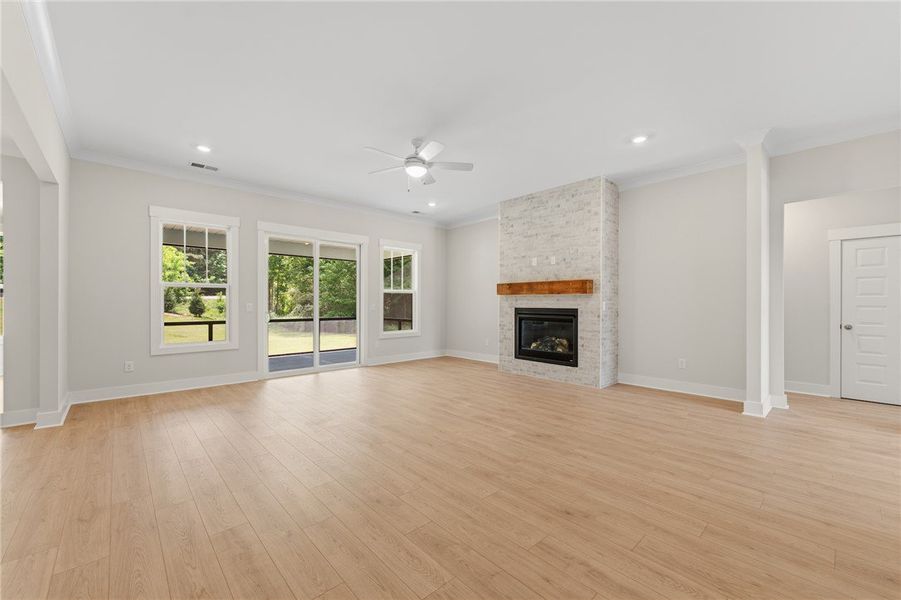A welcoming living area featuring a modern firepla