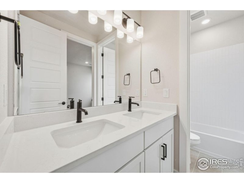 Furnished interior view inside a new home in Festival at RainDance, Windsor (Image 6).