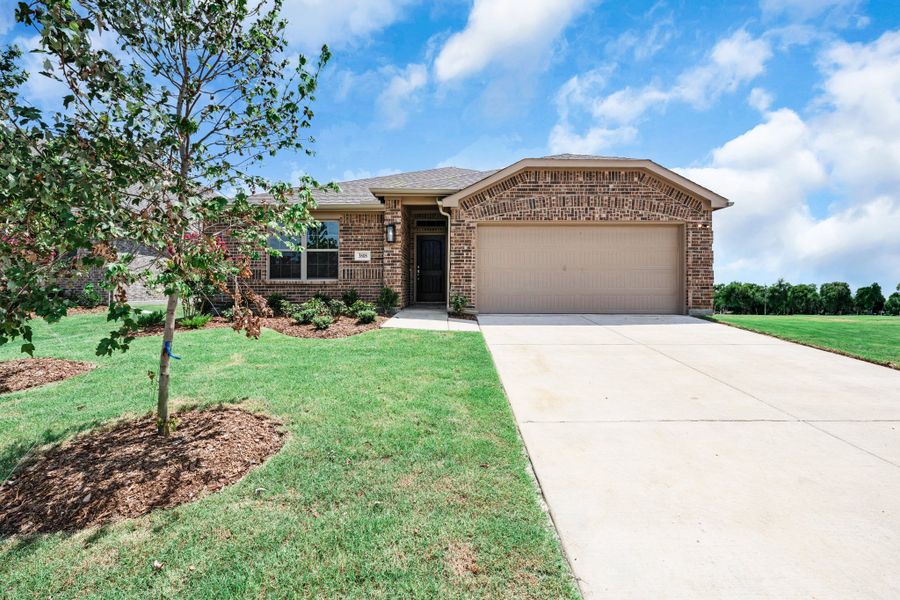 Front exterior of a new home in Fox Landing, Caddo Mills, TX, highlighting curb appeal (Image 17). Front exterior of a new home in Fox Landing, Caddo Mills, TX, highlighting curb appeal (Image 17).