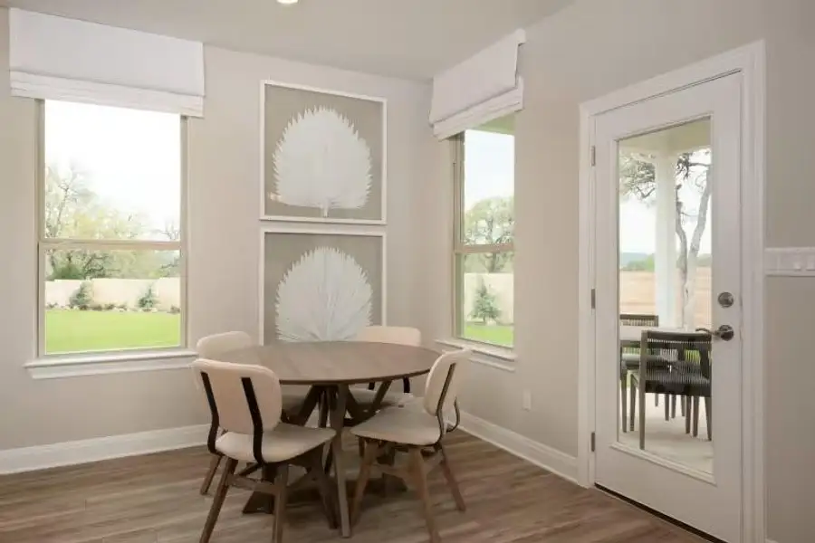 Photo of Pulte model home with same floor plan, not of actual home listed. Photo of Pulte model home with same floor plan, not of actual home listed.