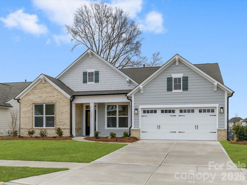 Front exterior of a new home in Encore at Harmony, Harrisburg, NC, highlighting curb appeal (Image 18).