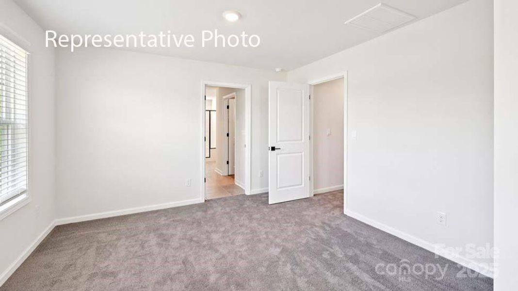 Spacious, unfurnished interior of a new home in Sanctuary at Southgate, Indian Trail (Image 27).