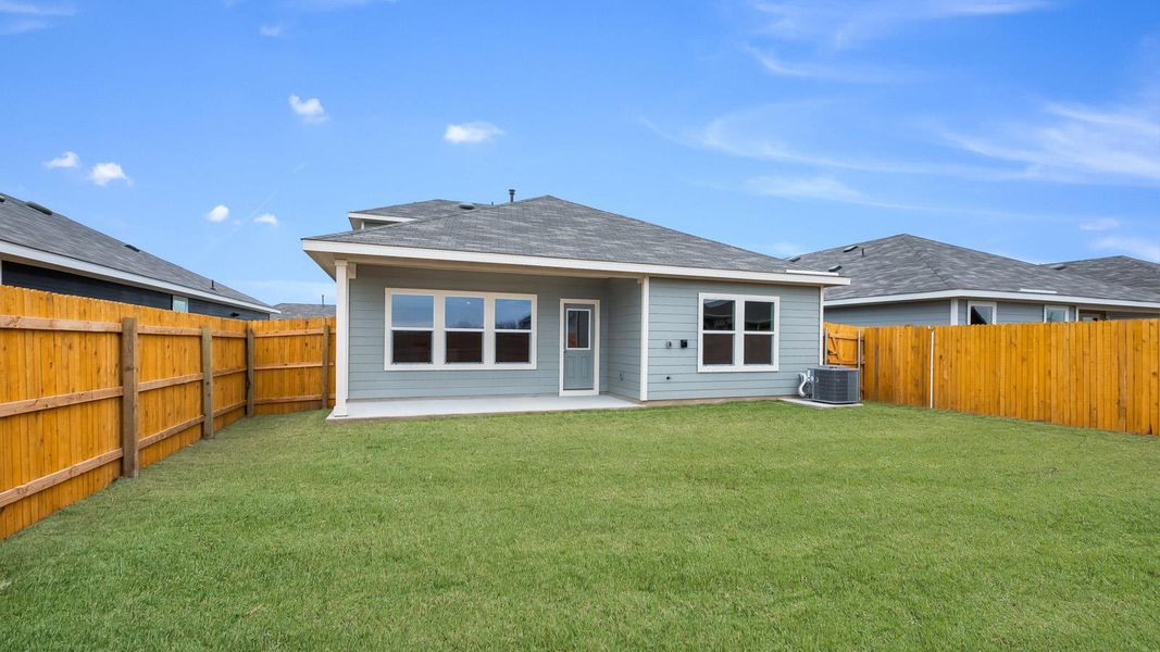 Front exterior of a new home in Talavera, Kyle, TX, highlighting curb appeal (Image 17). Front exterior of a new home in Talavera, Kyle, TX, highlighting curb appeal (Image 17).