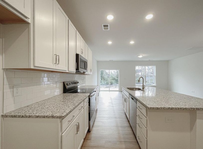 Furnished interior view inside a new home in East Main Townes, Spartanburg (Image 8).
