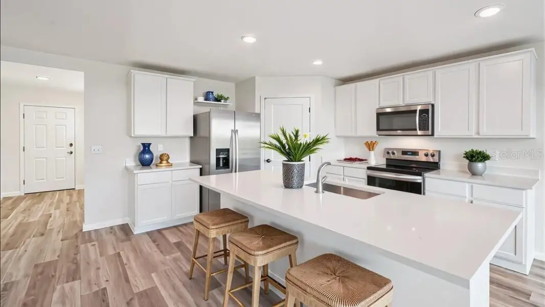 Furnished interior view inside a new home in Ridge at Heath Brook, Ocala (Image 8).