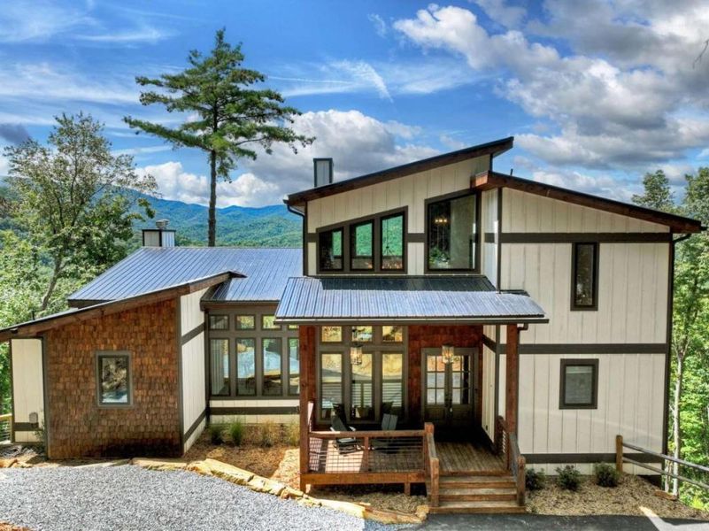 Front exterior of a new home in , Epworth, GA, highlighting curb appeal (Image 23).