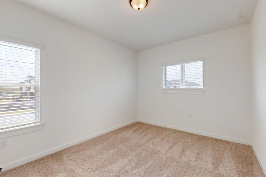 Spacious, unfurnished interior of a new home in Estancia West, Manchaca (Image 35).