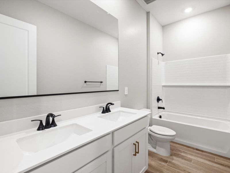 Furnished interior view inside a new home in Legacy Place, Glendale (Image 6).