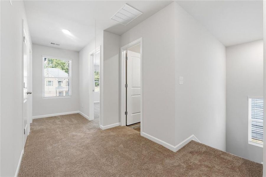 Spacious, unfurnished interior of a new home in River Walk Farm, Covington (Image 23).