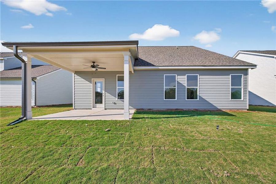 Exterior details and patio area of a home in Sutton's Landing, Statham (Image 3).