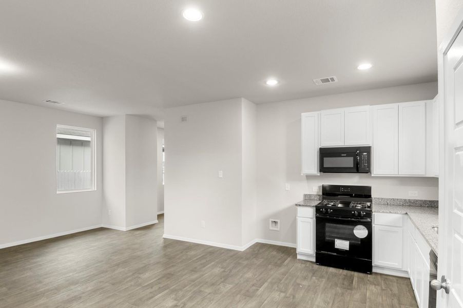 Furnished interior view inside a new home in Casetta Ranch, Kyle (Image 11).