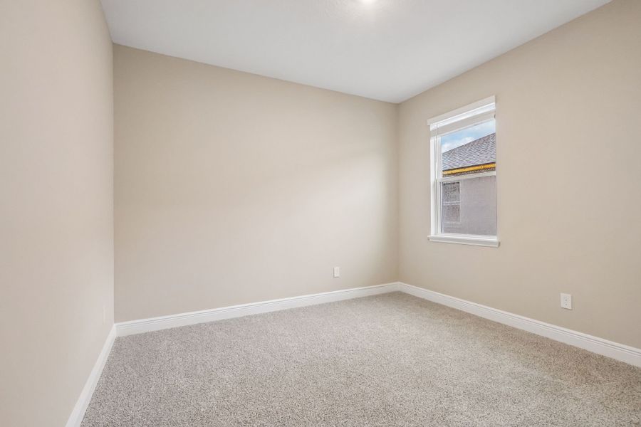 Spacious, unfurnished interior of a new home in Legends Preserve - Signature Series, Daytona Beach (Image 18).