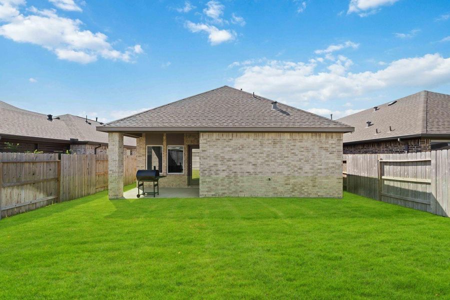 Fully fenced yard with plenty of space Fully fenced yard with plenty of space