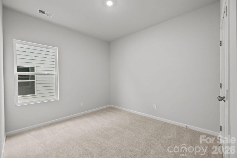 Spacious, unfurnished interior of a new home in Cottages at Wingate, Wingate (Image 11).