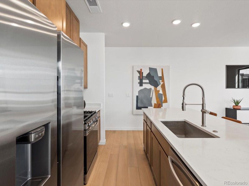 Furnished interior view inside a new home in The Hub at Virginia Village, Denver (Image 6).