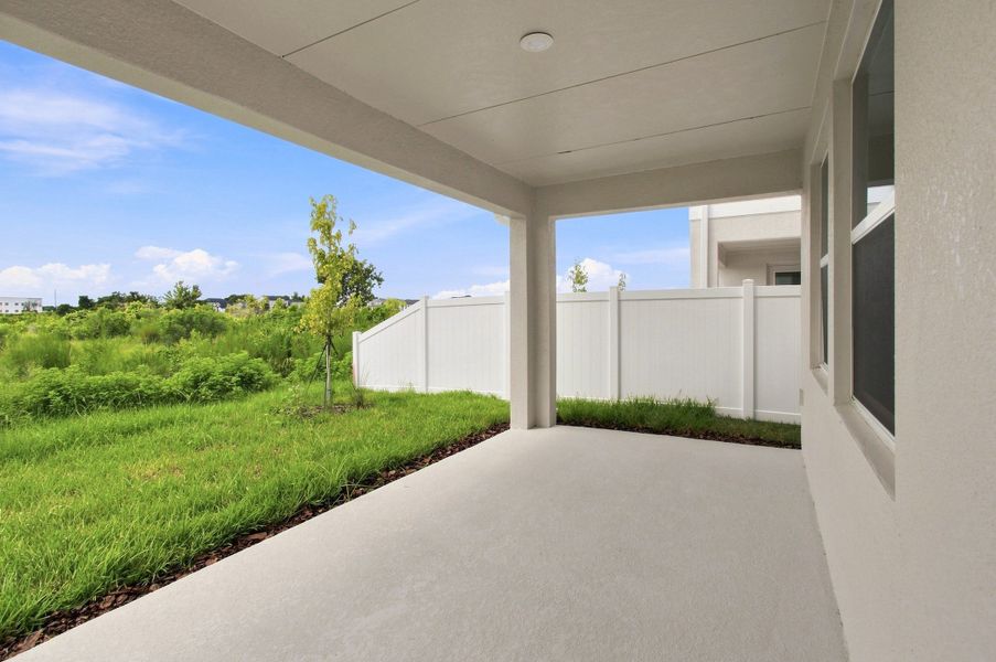 Exterior details and patio area of a home in Persimmon Place – Garden Series, Wesley Chapel (Image 4).