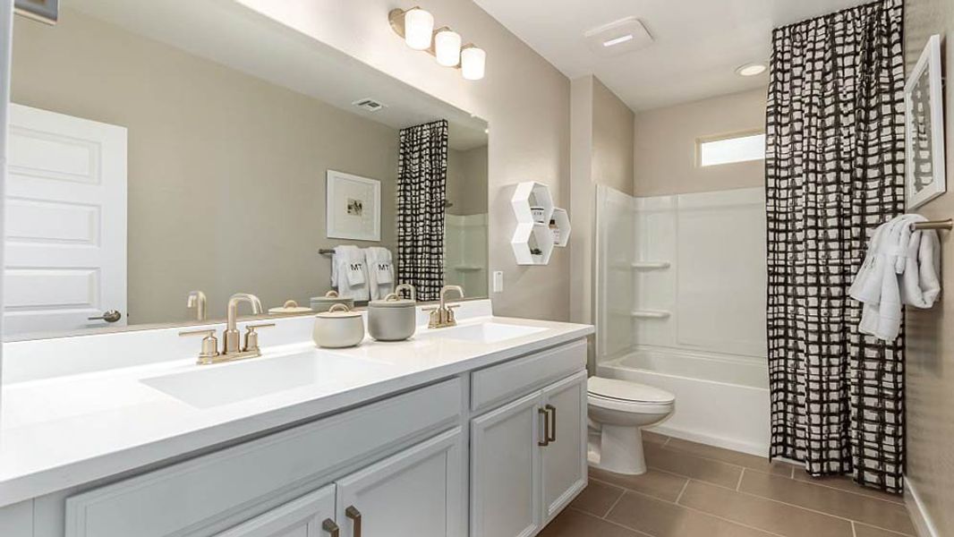 Representative furnished interior of a home built from the Redwood by Taylor Morrison in Paradisi, Surprise (Image 37).