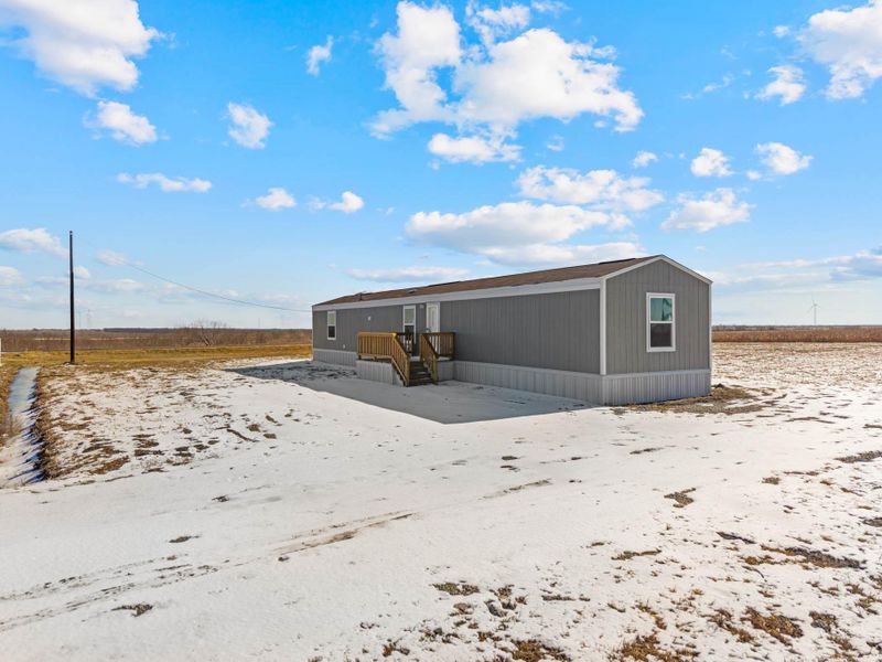 Exterior details and patio area of a home in , Dawson (Image 13). Exterior details and patio area of a home in , Dawson (Image 13).
