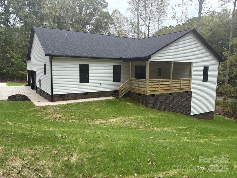Exterior details and patio area of a home in , Spencer (Image 17). Exterior details and patio area of a home in , Spencer (Image 17).