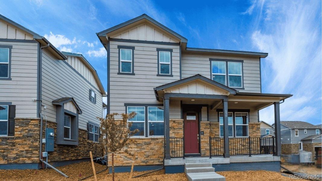 Front exterior of a new home in Horizon Uptown, Aurora, CO, highlighting curb appeal (Image 1). Front exterior of a new home in Horizon Uptown, Aurora, CO, highlighting curb appeal (Image 1).