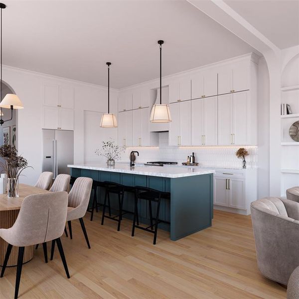 Kitchen featuring white cabinetry, a spacious island, light wood-style flooring, and crown molding
