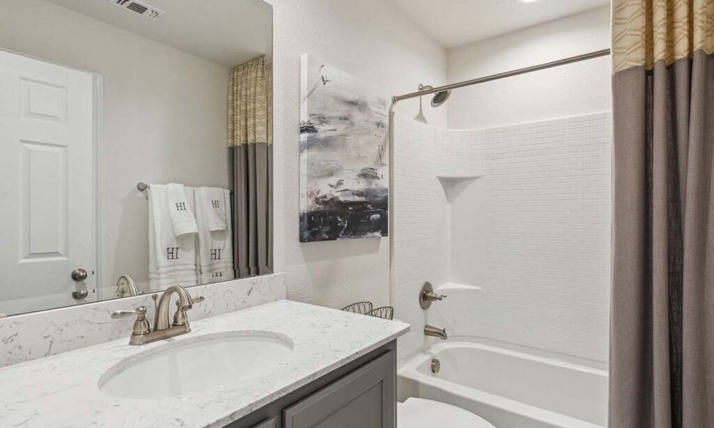 Front exterior of a new home in Rainbow Ridge, Fort Worth, TX, highlighting curb appeal (Image 20). Front exterior of a new home in Rainbow Ridge, Fort Worth, TX, highlighting curb appeal (Image 20).