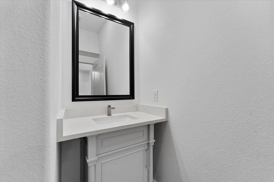 Close up view of the sink/vanity combo shows timeless looks, style, and color palette. Close up view of the sink/vanity combo shows timeless looks, style, and color palette.