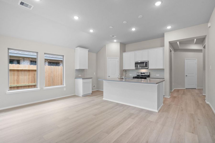 Furnished interior view inside a new home in The Highlands 45', Porter (Image 13).