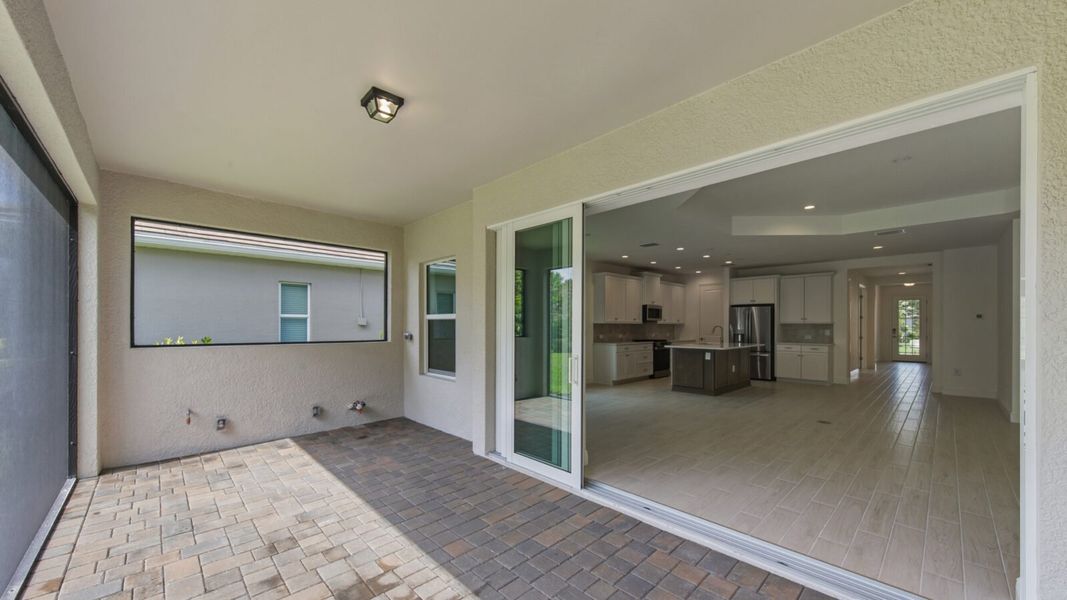 Exterior details and patio area of a home in Verandah, Fort Myers (Image 21).