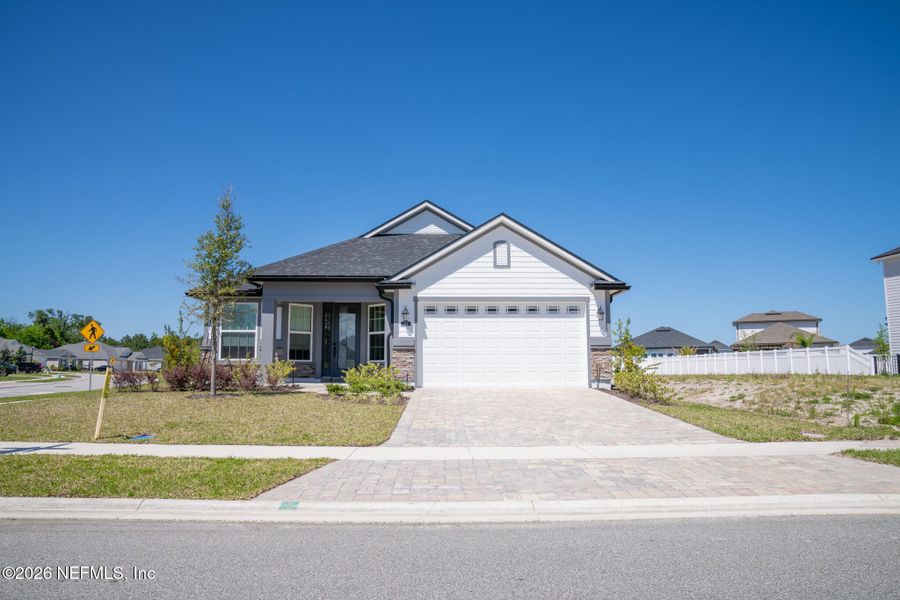 Front exterior of a new home in , St. Augustine, FL, highlighting curb appeal (Image 28).