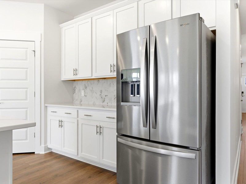 Furnished interior view inside a new home in The Coves at Lakes of Cane Bay, Summerville (Image 9).