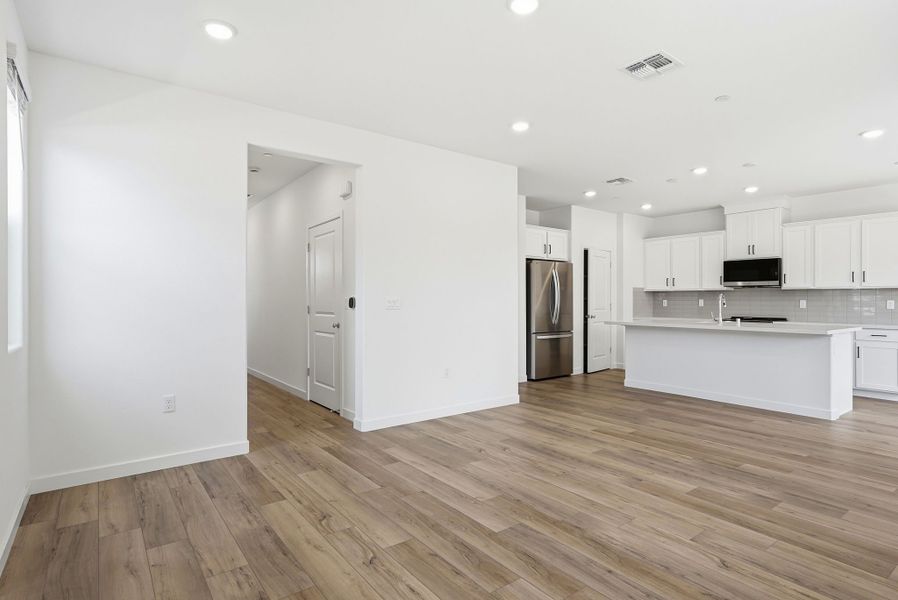 A kitchen with white cabinets. A kitchen with white cabinets.