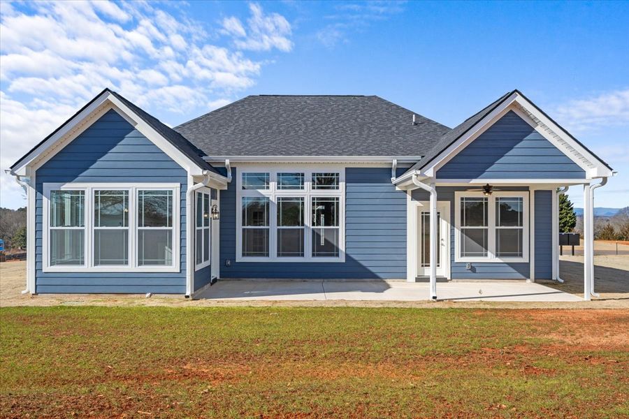 Representative exterior photo of a completed home built from the Roosevelt by Enchanted Homes in Messer Farms, Inman, SC (Image 2). Representative exterior photo of a completed home built from the Roosevelt by Enchanted Homes in Messer Farms, Inman, SC (Image 2).