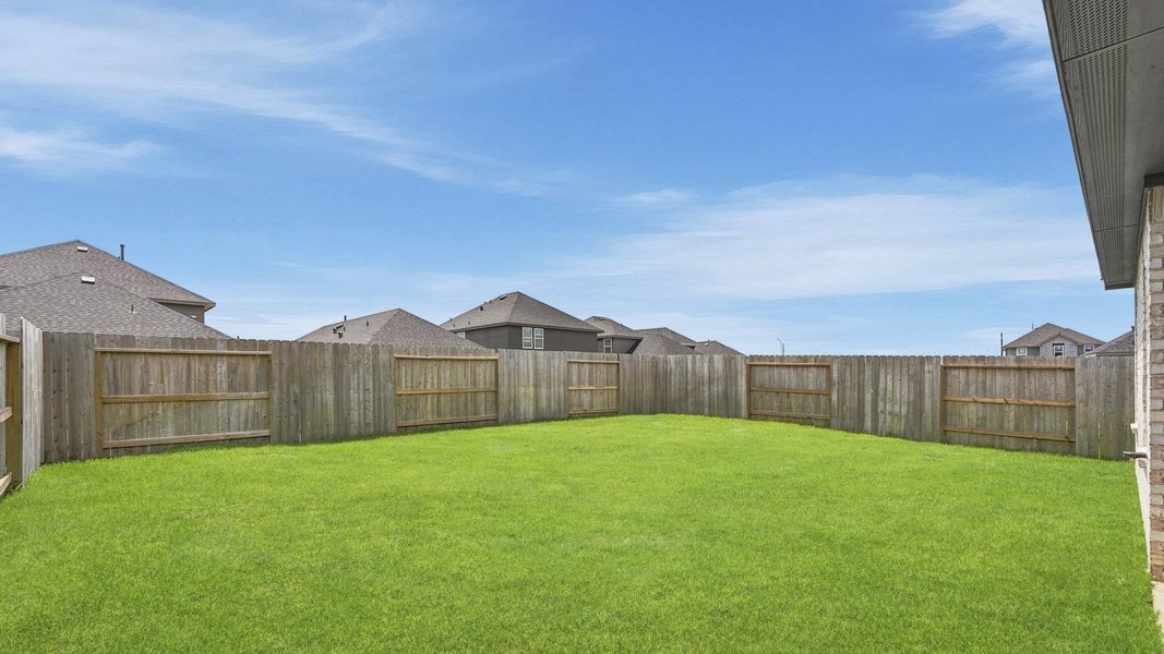 Exterior details and patio area of a home in Cypress Green, Tomball (Image 3).