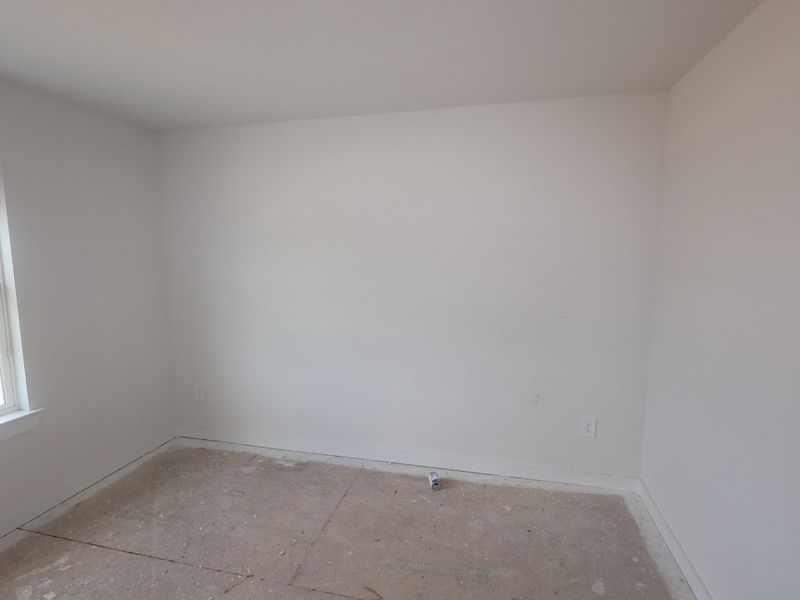 Spacious, unfurnished interior of a new home in Pinewood at Grand Texas, New Caney (Image 29).