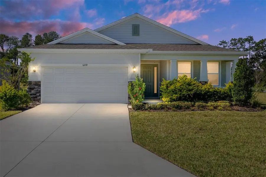 Front exterior of a new home in JB Ranch, Ocala, FL, highlighting curb appeal (Image 2). Front exterior of a new home in JB Ranch, Ocala, FL, highlighting curb appeal (Image 2).