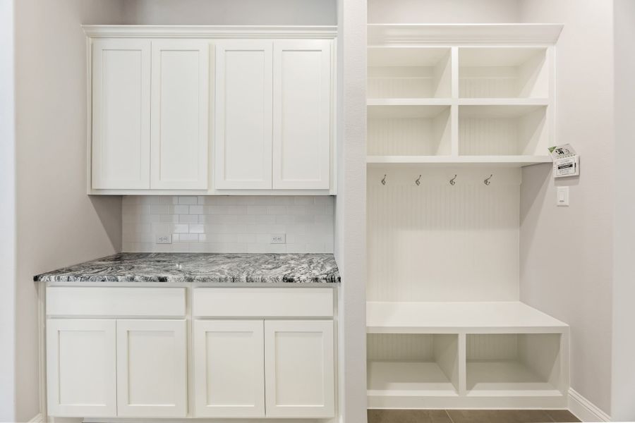 Representative furnished interior of a home built from the Bridgeport by UnionMain Homes in Lake Breeze, Lavon (Image 14).