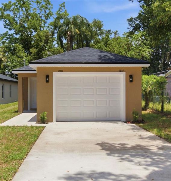 Front exterior of a new home in , Eustis, FL, highlighting curb appeal (Image 20). Front exterior of a new home in , Eustis, FL, highlighting curb appeal (Image 20).
