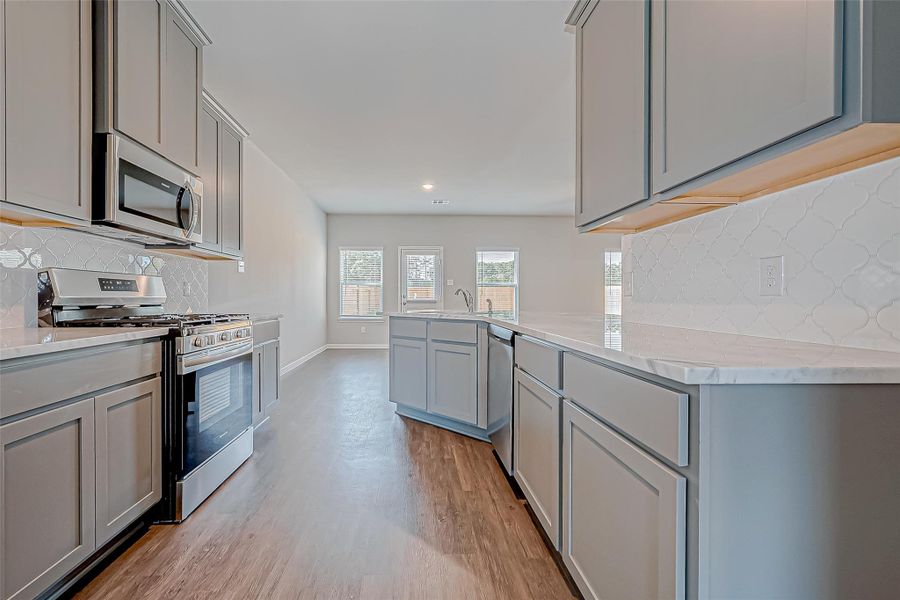Furnished interior view inside a new home in Mill Creek Trails, Magnolia (Image 8).