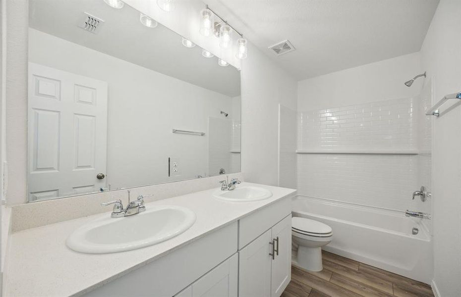 Upgraded secondary bathroom *real home pictured