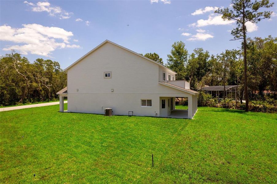 Front exterior of a new home in , Deltona, FL, highlighting curb appeal (Image 28).