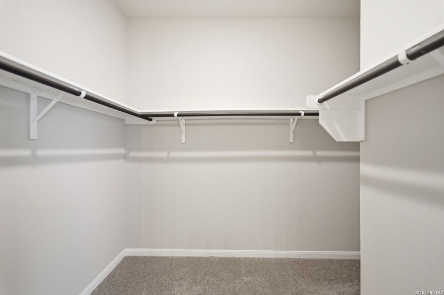 Spacious, unfurnished interior of a new home in Hennersby Hollow, San Antonio (Image 23).