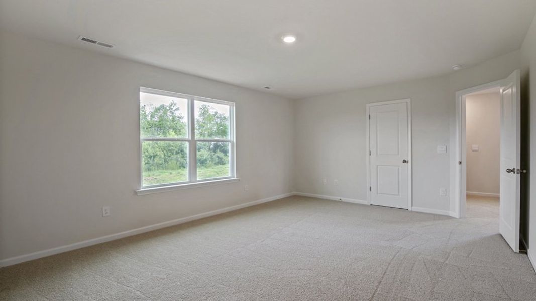 Spacious, unfurnished interior of a new home in The Grove at Matthews Landing, Fuquay Varina (Image 27).