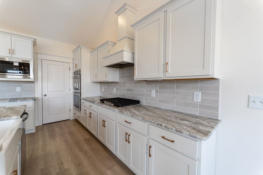 Furnished interior view inside a new home in Aden Woods, Fairview (Image 10). Furnished interior view inside a new home in Aden Woods, Fairview (Image 10).