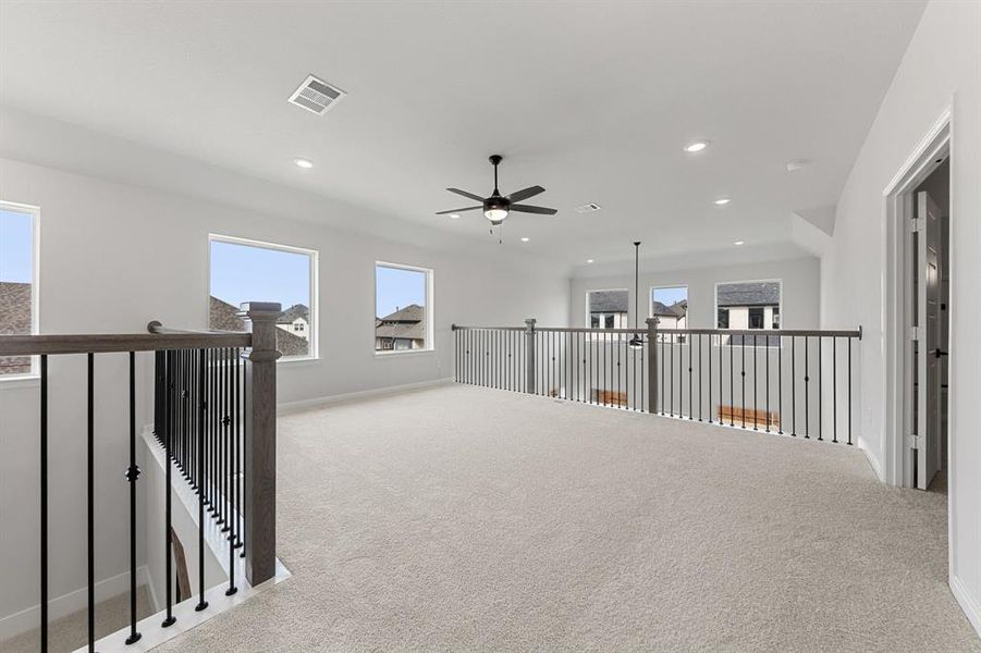 Light, bright and airy, the family fun time never ends in this over the top game room! Light, bright and airy, the family fun time never ends in this over the top game room!
